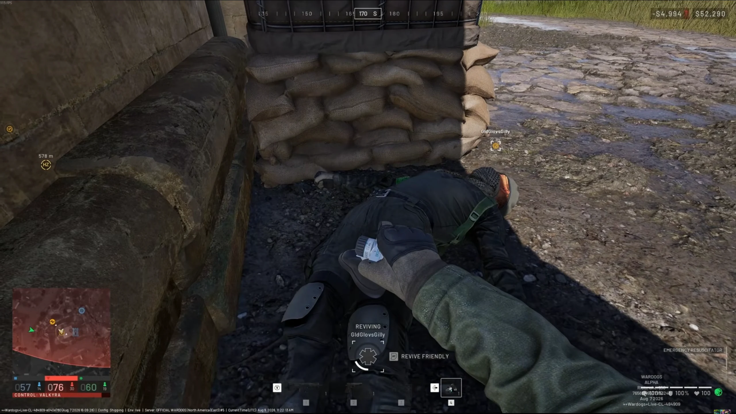 WARDOGS teammate revive interaction beside a downed player